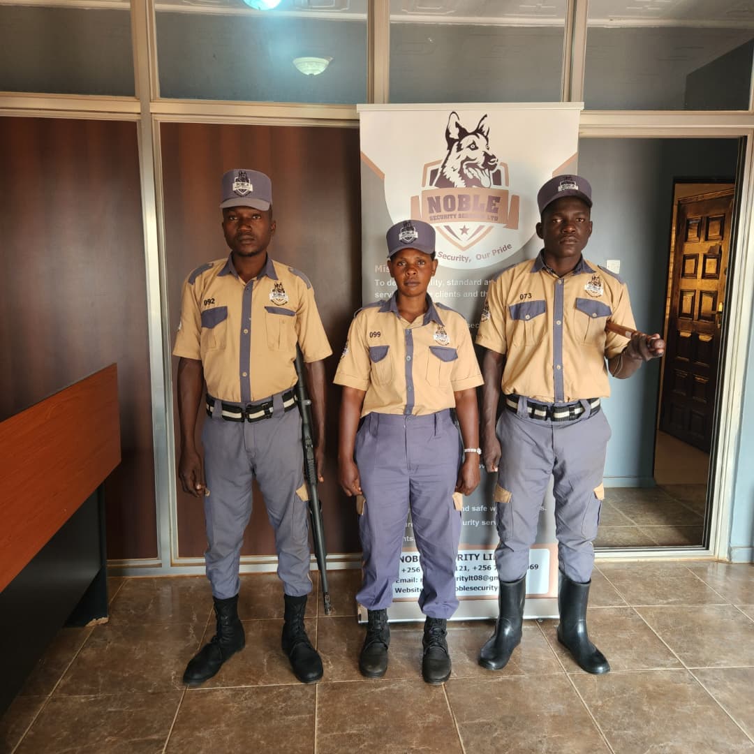 Three Noble Security officers standing in company uniform