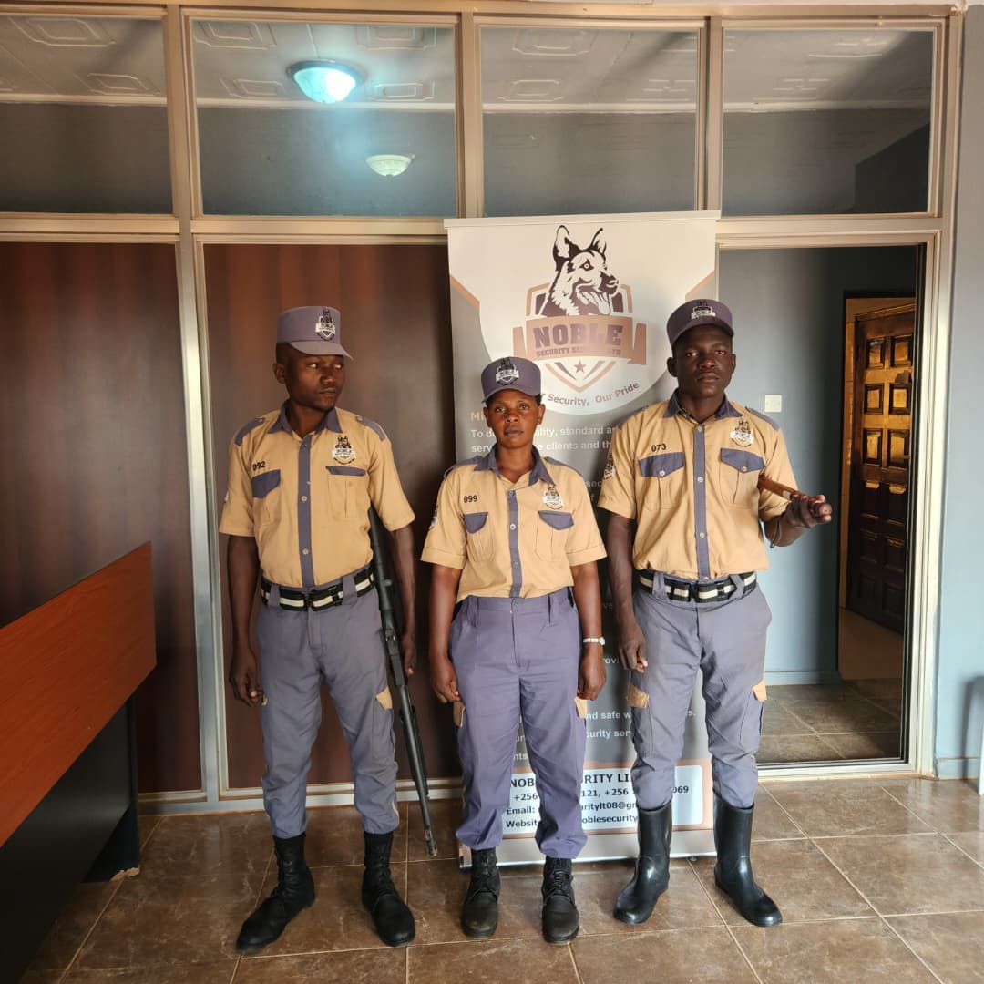 Three Noble Security officers in full uniform